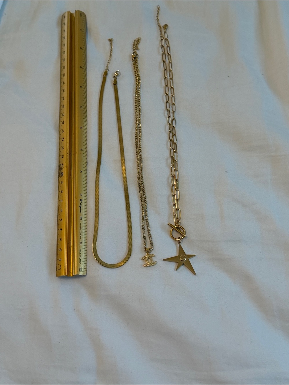 Gold-Tone Layered Star & Interlocking CC Pendant Necklace - - Picture 9 of 14